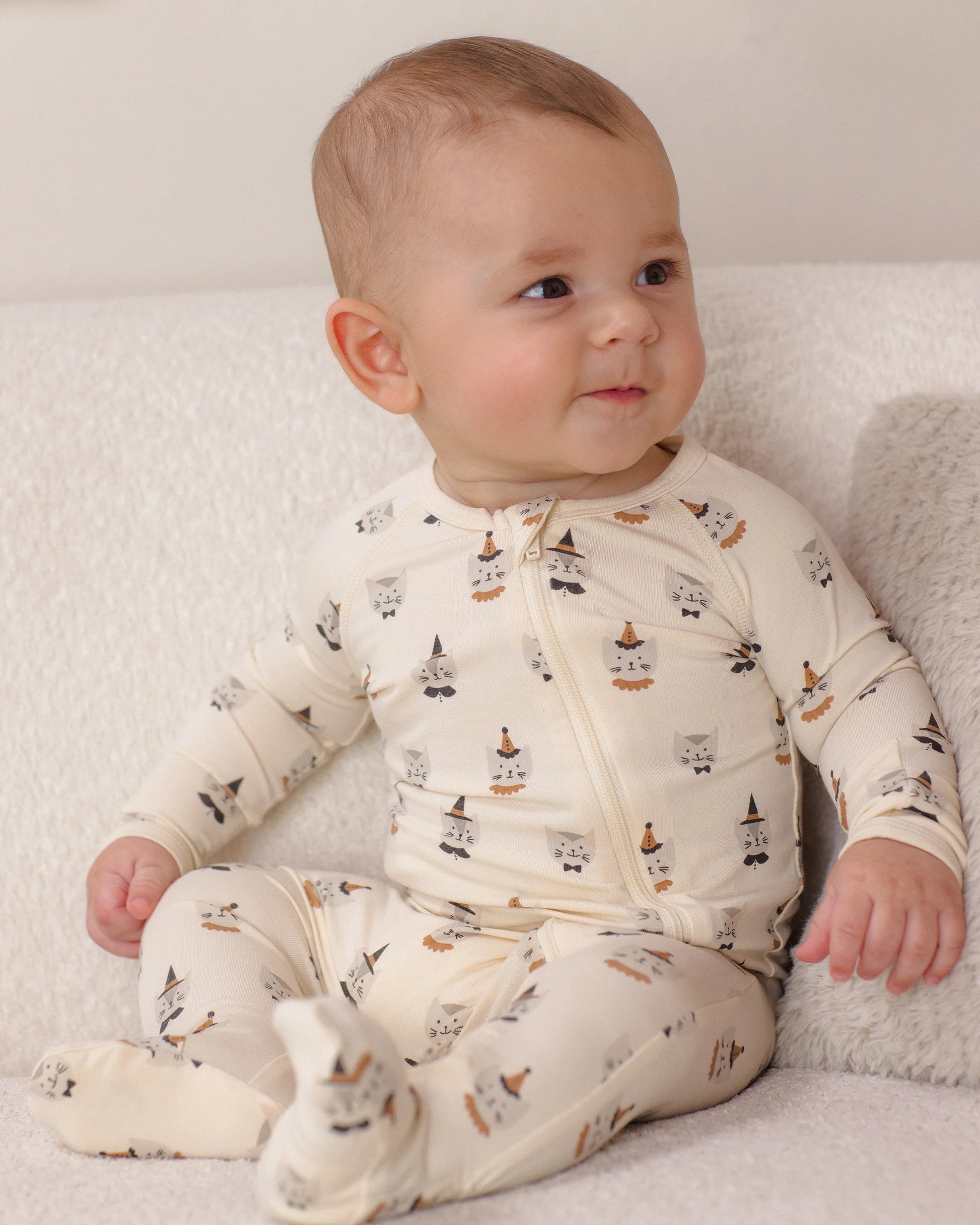 Quincy Mae kitten-themed bamboo zip footie costume for babies, featuring soft fabric and a cozy design with cute kitten details.