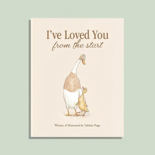 Close-up of the book "I've Loved You from the Start" by Paige Tate & Co. with a soft, inviting cover design.
