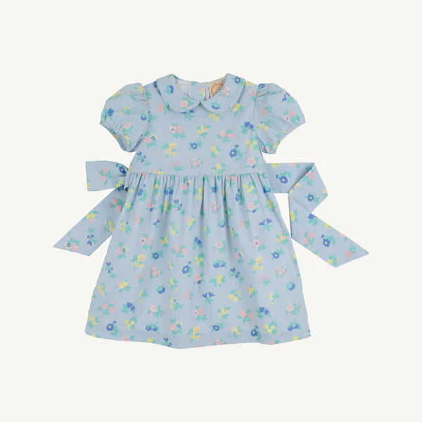 Little London Flowers Cindy Lou sash dress by The Beaufort Bonnet Company, made of broadcloth with floral print and bow detail.