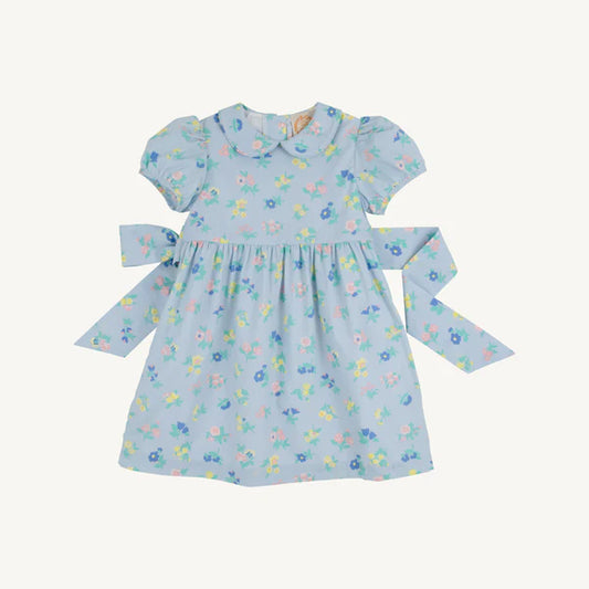Little London Flowers Cindy Lou sash dress by The Beaufort Bonnet Company, made of broadcloth with floral print and bow detail.