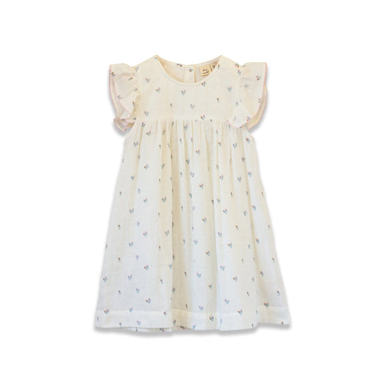 Petit Floret Girls Hannah Dress with Flutter Sleeves by Beet World, featuring a charming floral design and delicate flutter sleeves.