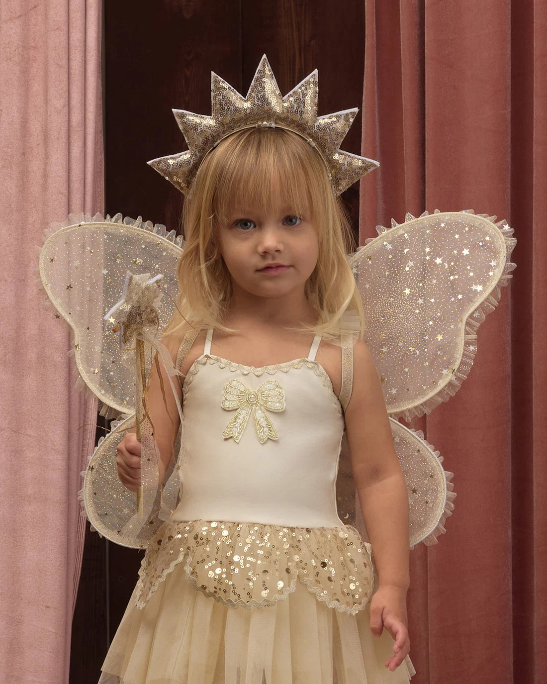 Noralee gold sun crown and matching wand set, featuring sun-themed design with sparkling accents, perfect for costume or dress-up.