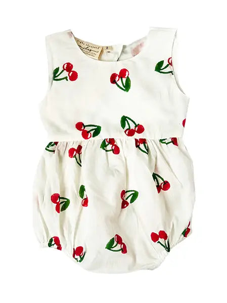 Cherry back cut out romper by eight thousand miles, featuring a stylish back cutout and vibrant cherry print.