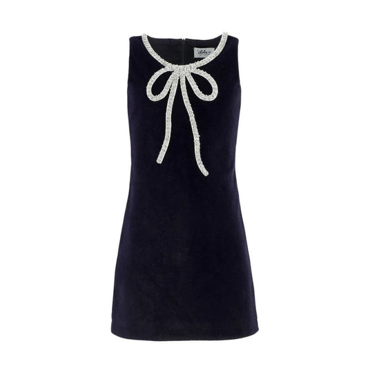 Velvet bow princess dress for girls by Lola and The Boys, featuring a soft velvet fabric and elegant bow details.