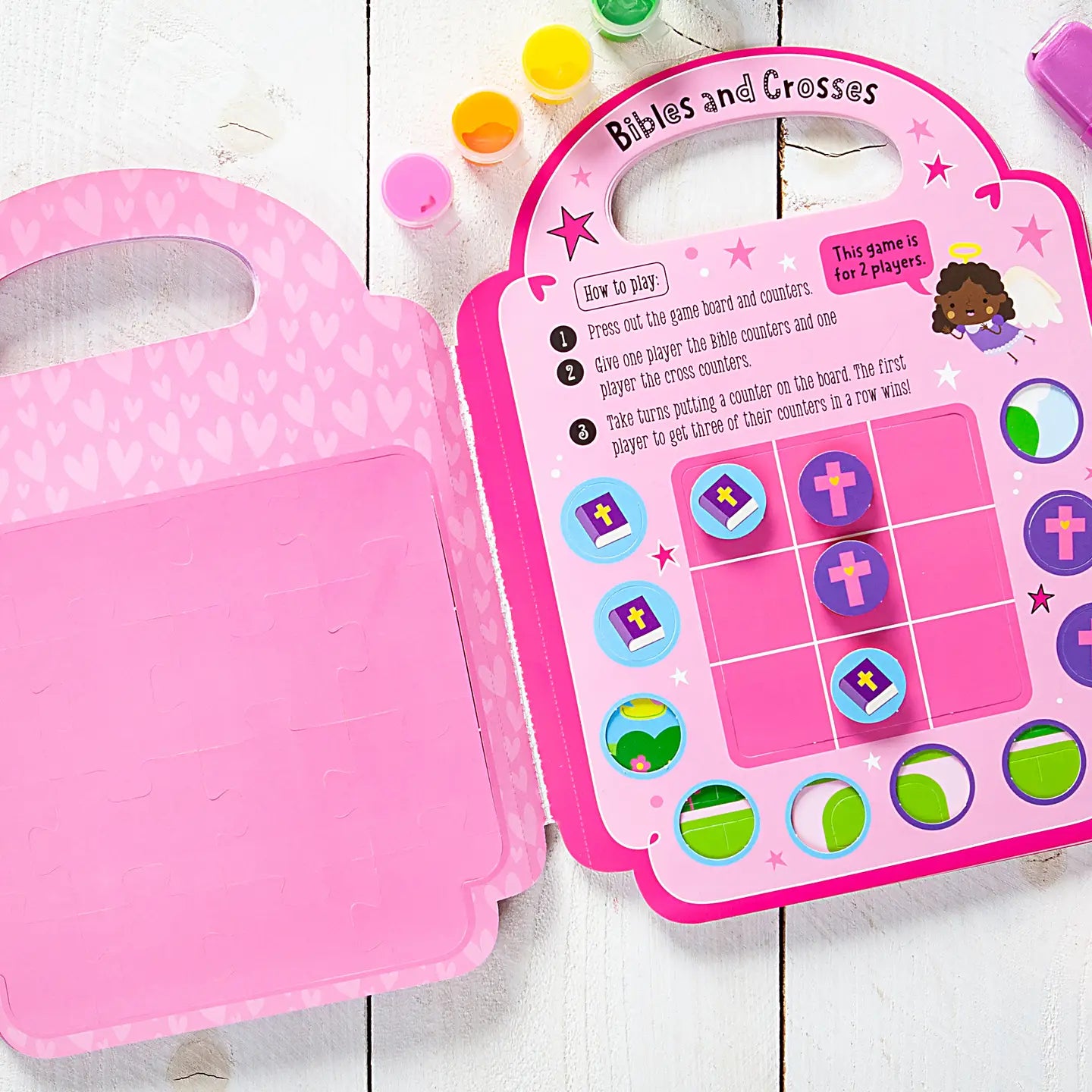 My Pretty Pink Bible Activity Book by BroadStreet Publishing features colorful pages with fun Bible-themed puzzles and activities.