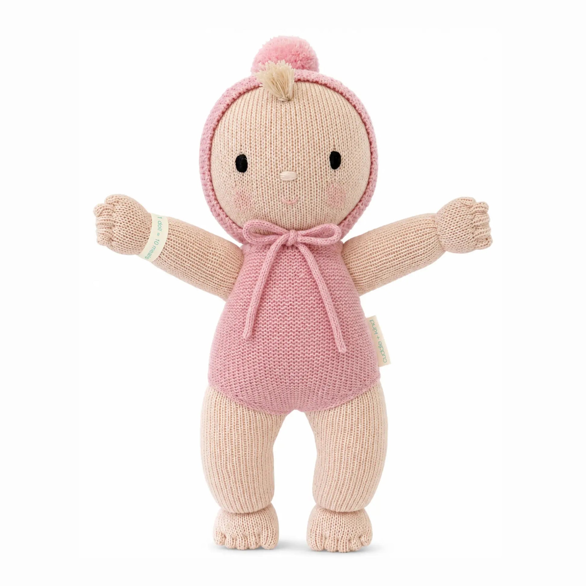 Soft pink plush toy from Cuddle + Kind's My First Baby Rose collection, featuring a gentle, cuddly design for infants.