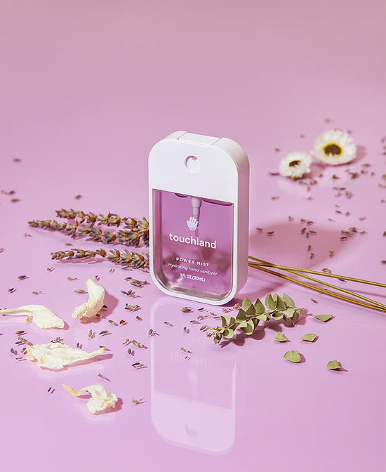 Touchland Powermists pure lavender hand sanitizer spray bottle with lavender scent and sleek design.