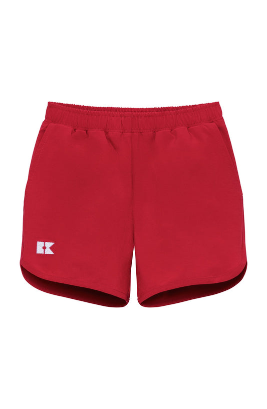 Bright red Courtside Kids super short shorts for kids, featuring a comfortable fit and sporty design.