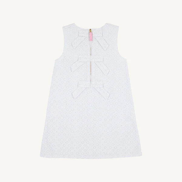Back view of The Beaufort Bonnet Company Worth Ave White Sleeveless Betts Bow Eyelet Dress with eyelet fabric and bow detail.