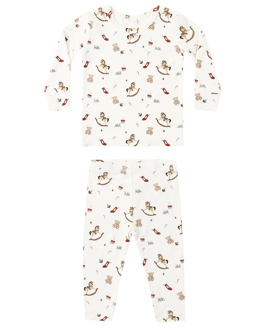 Quincy Mae bamboo toy chest with matching pajama set, featuring soft fabric and playful design, perfect for children's bedroom storage and sleepwear.