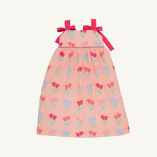 The Flower in the Dell Macie Midi Dress by The Beaufort Bonnet Company features a floral pattern and flowing silhouette.