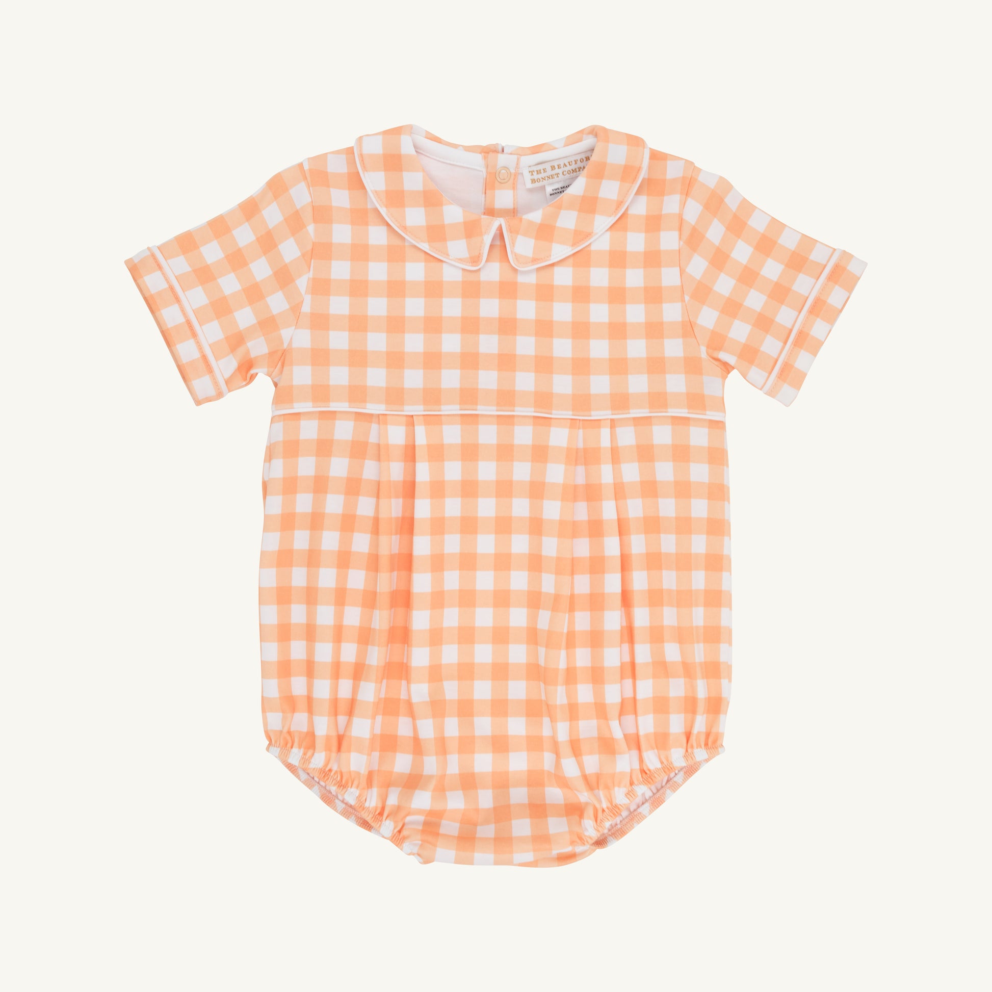 The Beaufort Bonnet Company Seashore Sherbet Gingham and Worth Ave White Bradford Bubble baby outfit on a hanger.