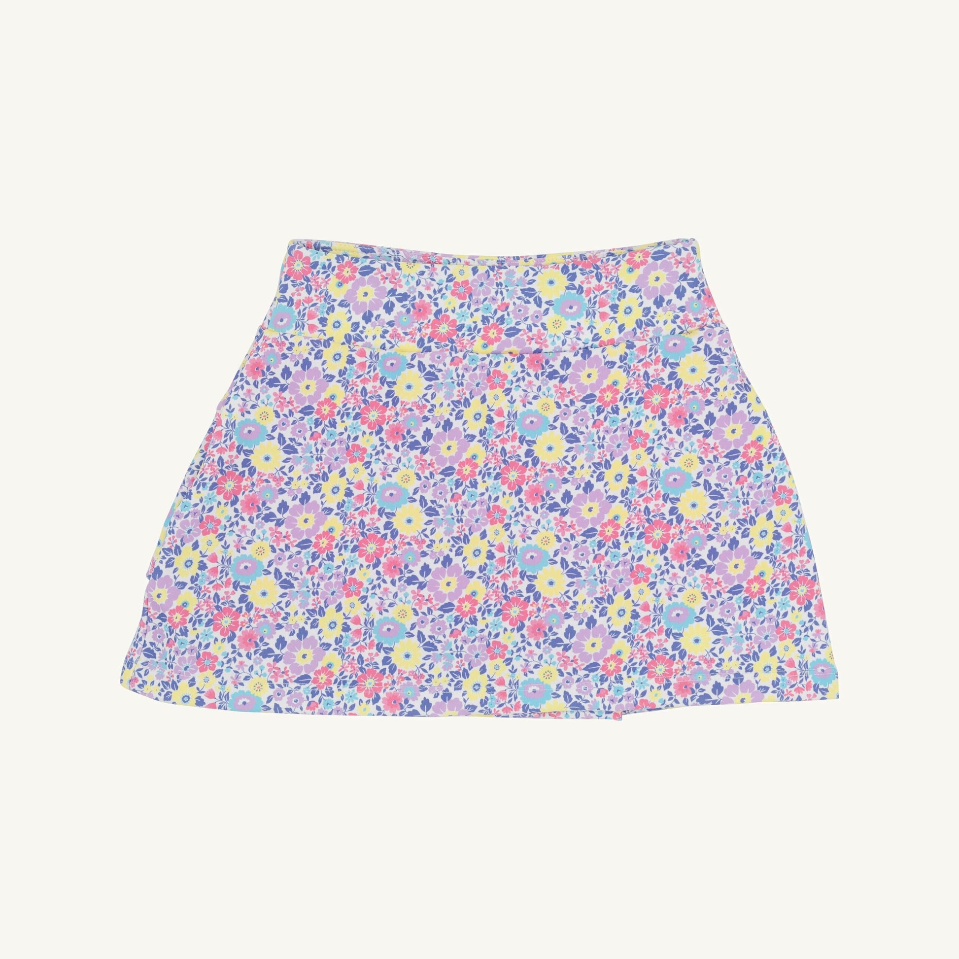 White prepletic Cindy skort with petal design from The Beaufort Bonnet Company, showcasing lightweight cotton fabric and floral accents.