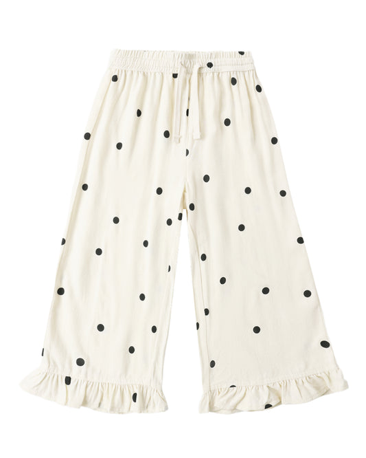 Rylee & Cru polka dot wide leg pants with a relaxed fit and high waist, featuring a playful black and white dot pattern.