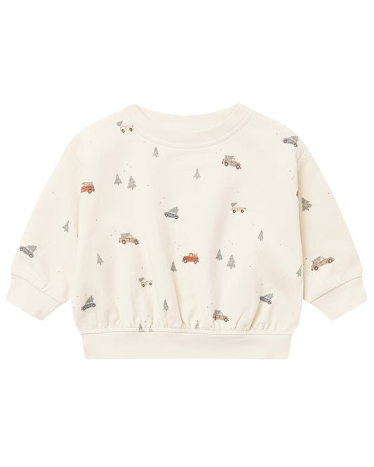 Relaxed fleece sweatshirt by Quincy Mae with holiday-themed design, soft texture, and cozy fit, shown in a casual style.