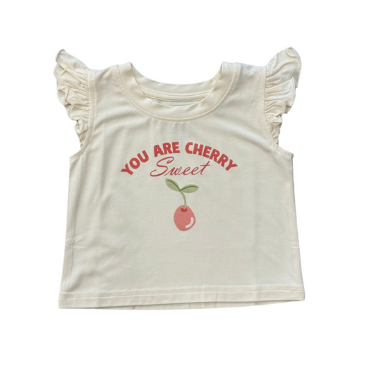 Pink sleeveless girls' top from Babysprouts with cherry print and ruffled neckline, ideal for warm weather.