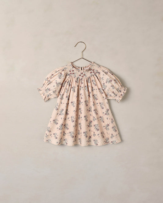 Noralee French Floral Maddie Dress featuring a vibrant floral pattern and flowing fabric, perfect for summer or casual wear.