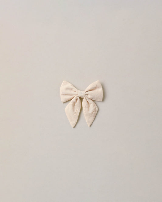 Noralee embroidered floral Norah bow with detailed embroidery and vibrant floral design, perfect for accessories or hair adornment.