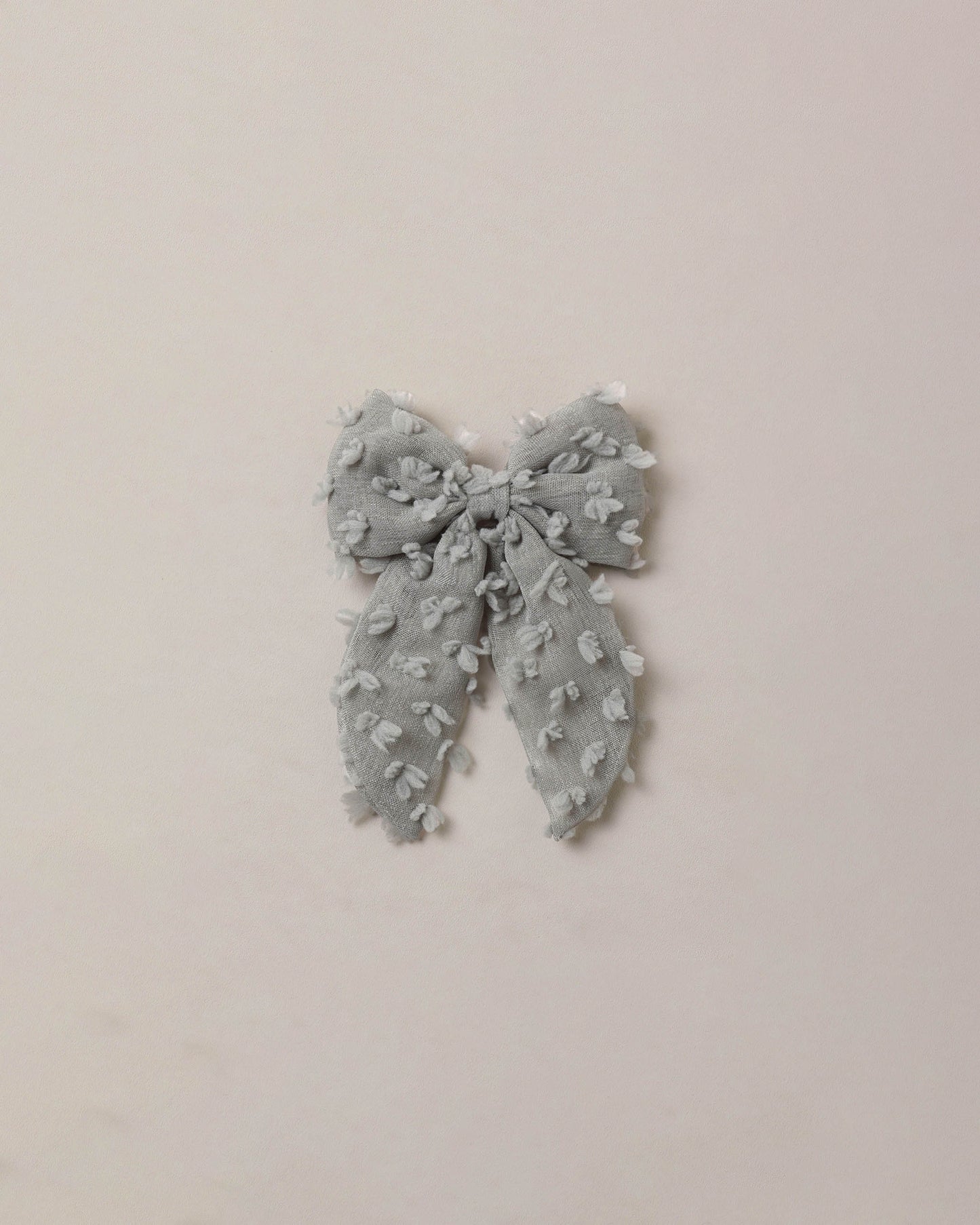 Eucalyptus Everly Bow hair accessory by Noralee featuring a soft, green eucalyptus-themed bow for stylish hair decoration