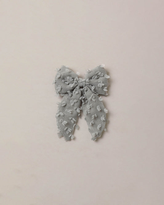 Eucalyptus Everly Bow hair accessory by Noralee featuring a soft, green eucalyptus-themed bow for stylish hair decoration