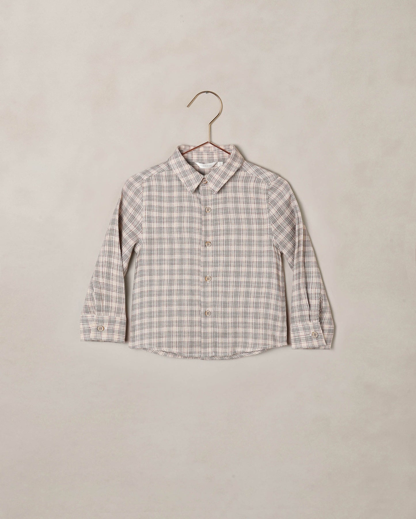 Noralee Fall Plaid Harrison Button Down shirt featuring a classic plaid pattern and button-up front, displayed on a hanger.