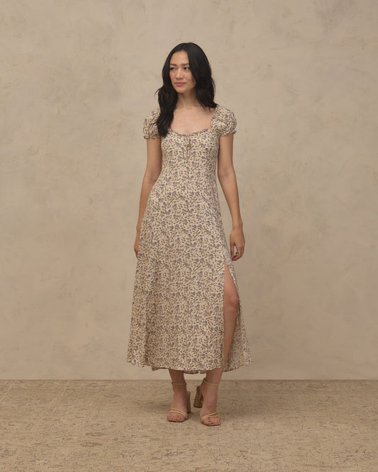Women's blue Garden Nancy dress by Noralee, featuring floral pattern and lightweight fabric, displayed on a hanger.