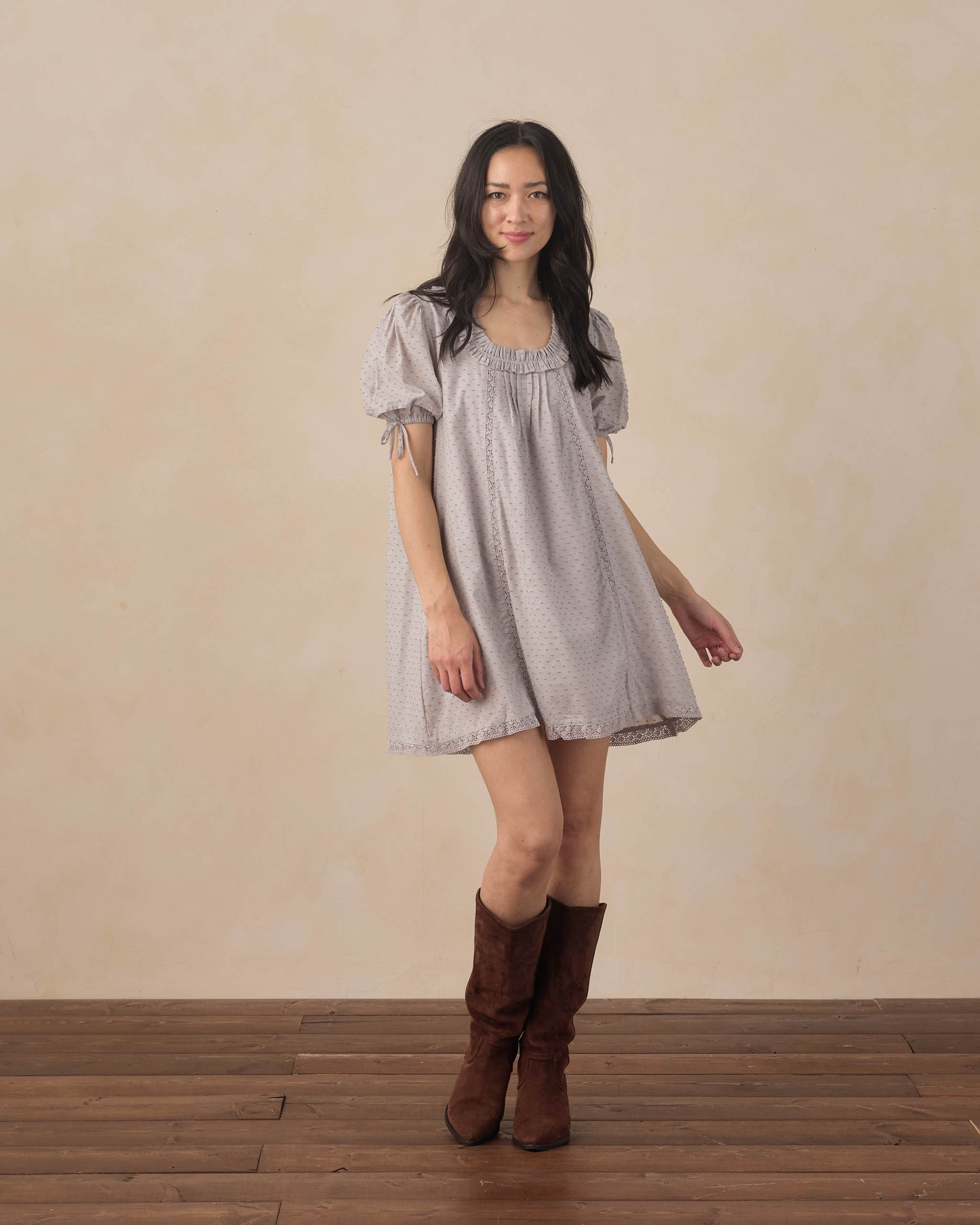 Women's dusty blue Shiloh dress by Rylee & Cru, featuring a flowy fabric and relaxed fit, displayed on a hanger.