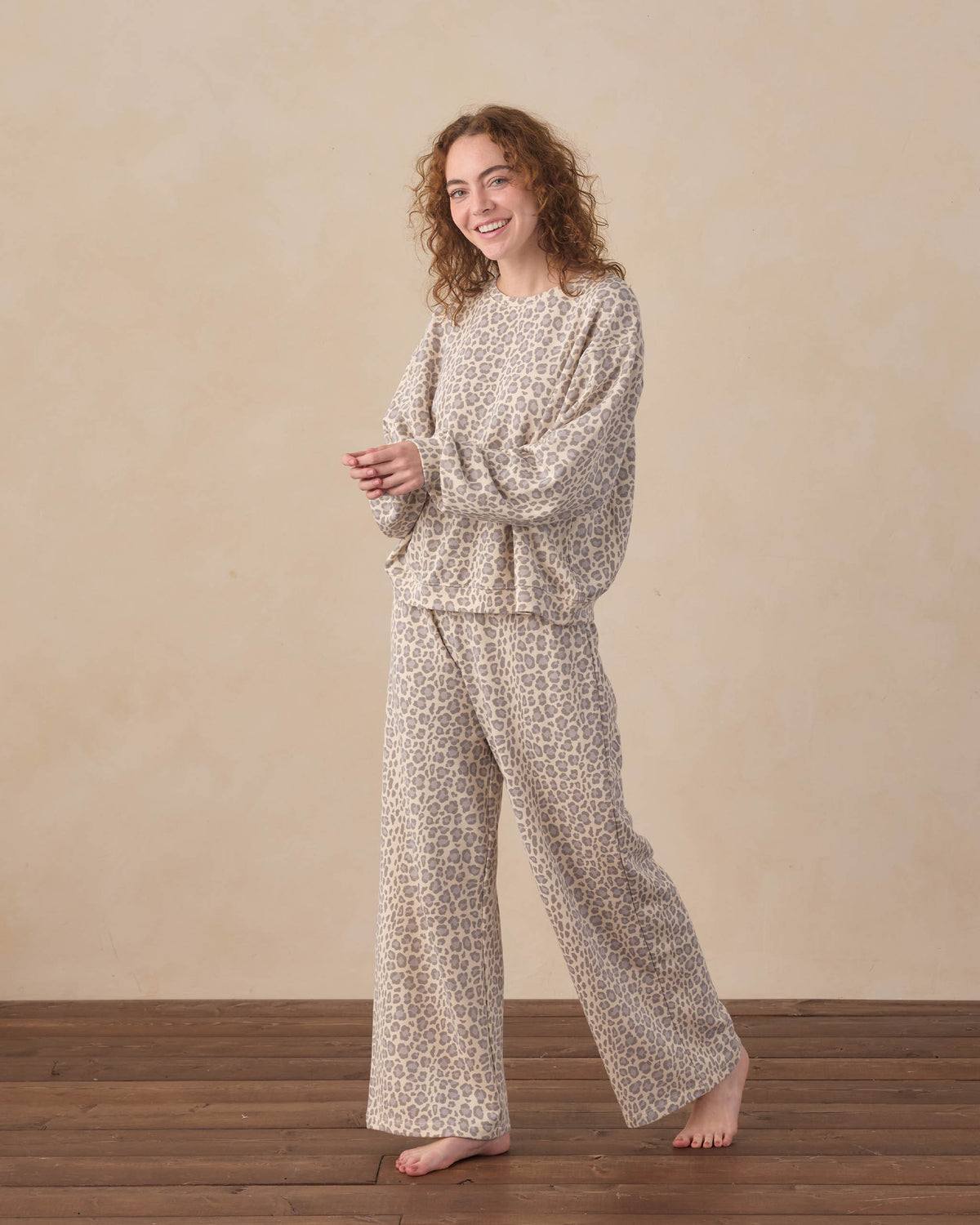 Women's blue leopard wide-leg sweatpants by Rylee & Cru, featuring a relaxed fit and bold leopard print pattern.