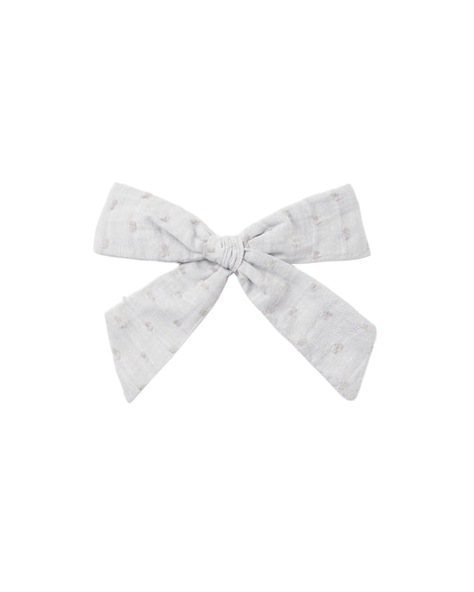 Dusty blue bow headband by Rylee & Cru featuring soft fabric and a charming knot design for infants and toddlers.