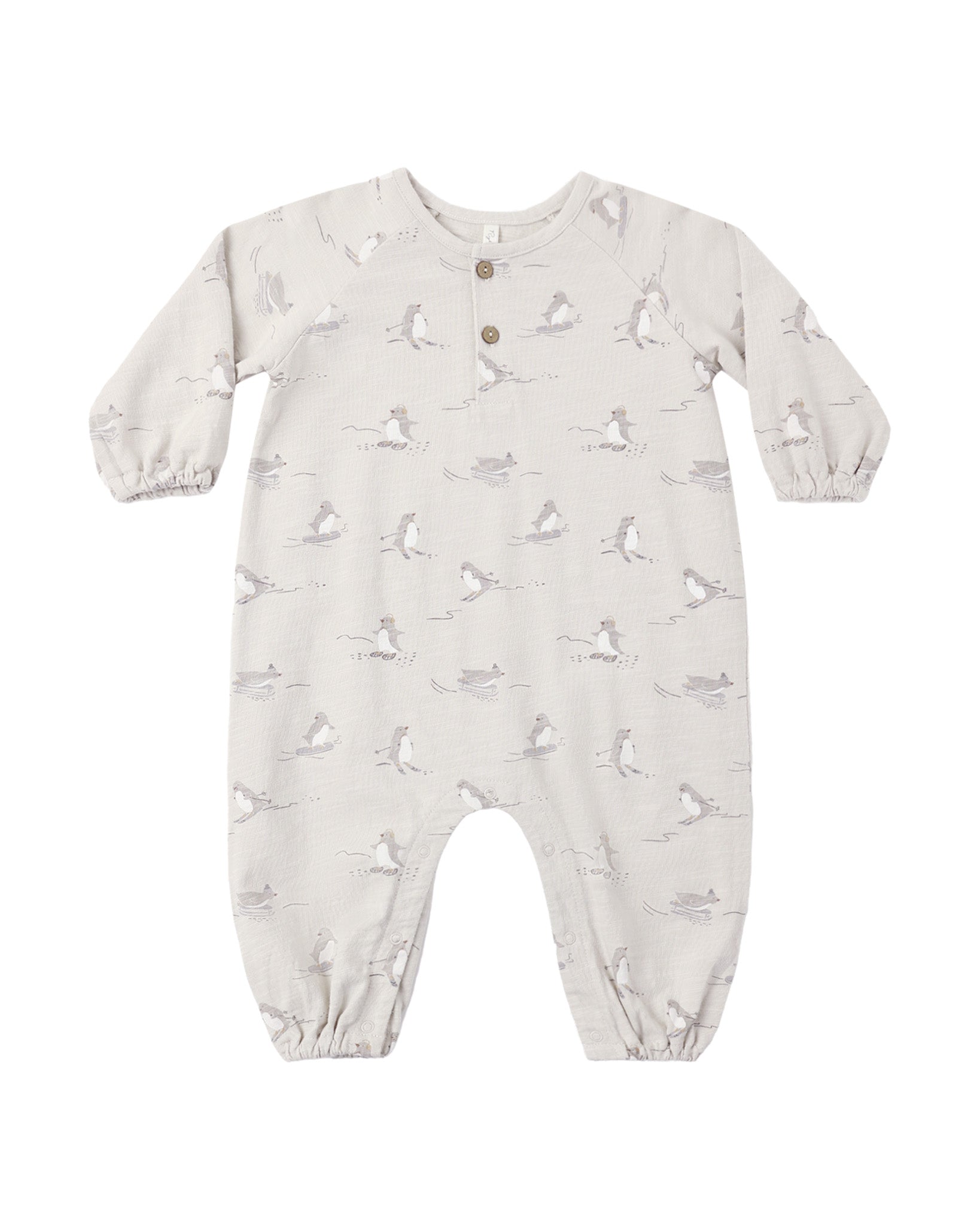 Rylee & Cru skiing penguins Henley jumpsuit featuring a playful penguin print, long sleeves, and cozy fabric for kids.