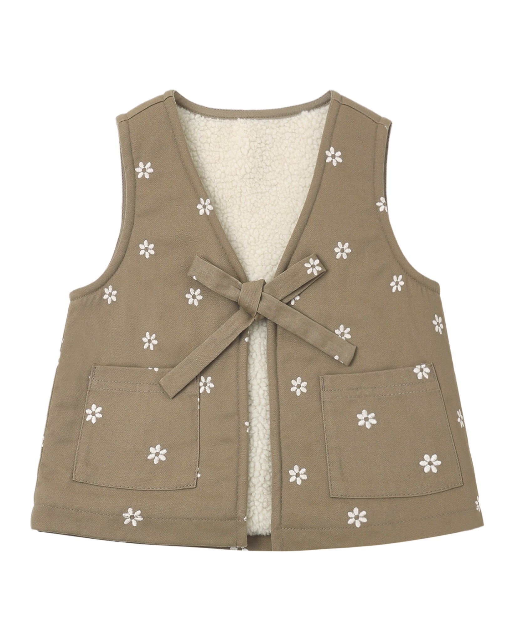 Embroidered daisies on Rylee & Cru utility vest, showcasing floral embroidery and functional design with multiple pockets.