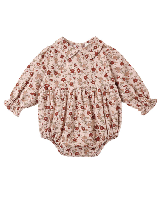 Pink floral Cora romper by Rylee & Cru featuring a sleeveless design and playful floral pattern.