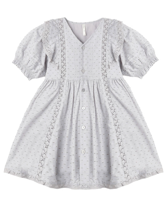 Dusty blue Lana dress by Rylee & Cru shown on a hanger, featuring a soft, flowy fabric and simple, elegant design.
