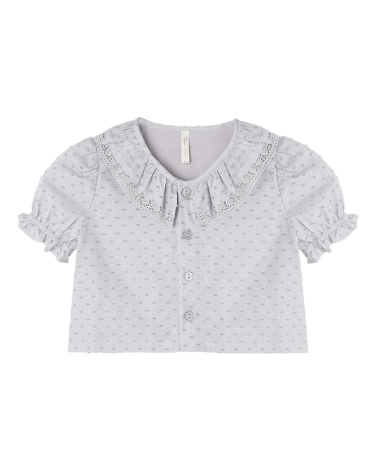 Dusty blue Bella blouse by Rylee & Cru featuring long sleeves, a relaxed fit, and soft fabric, displayed on a hanger.
