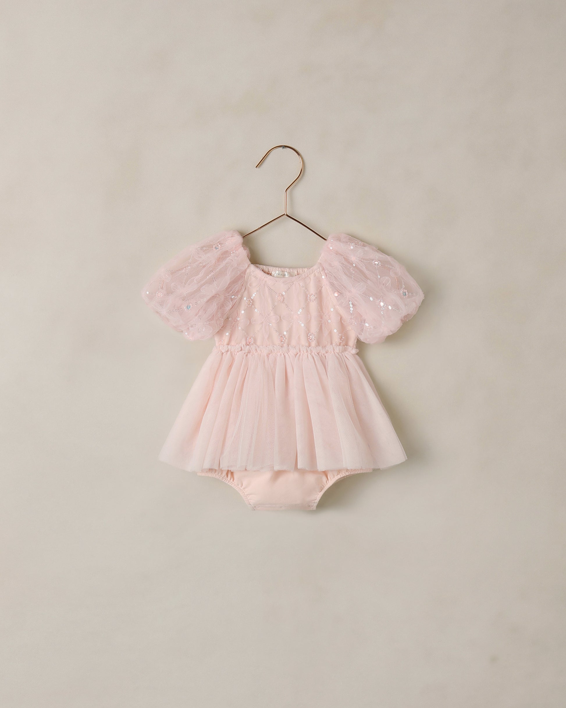 Pink blush Dorothy Tutu from Noralee featuring soft tulle layers and a delicate waistband, perfect for dance or special occasions.
