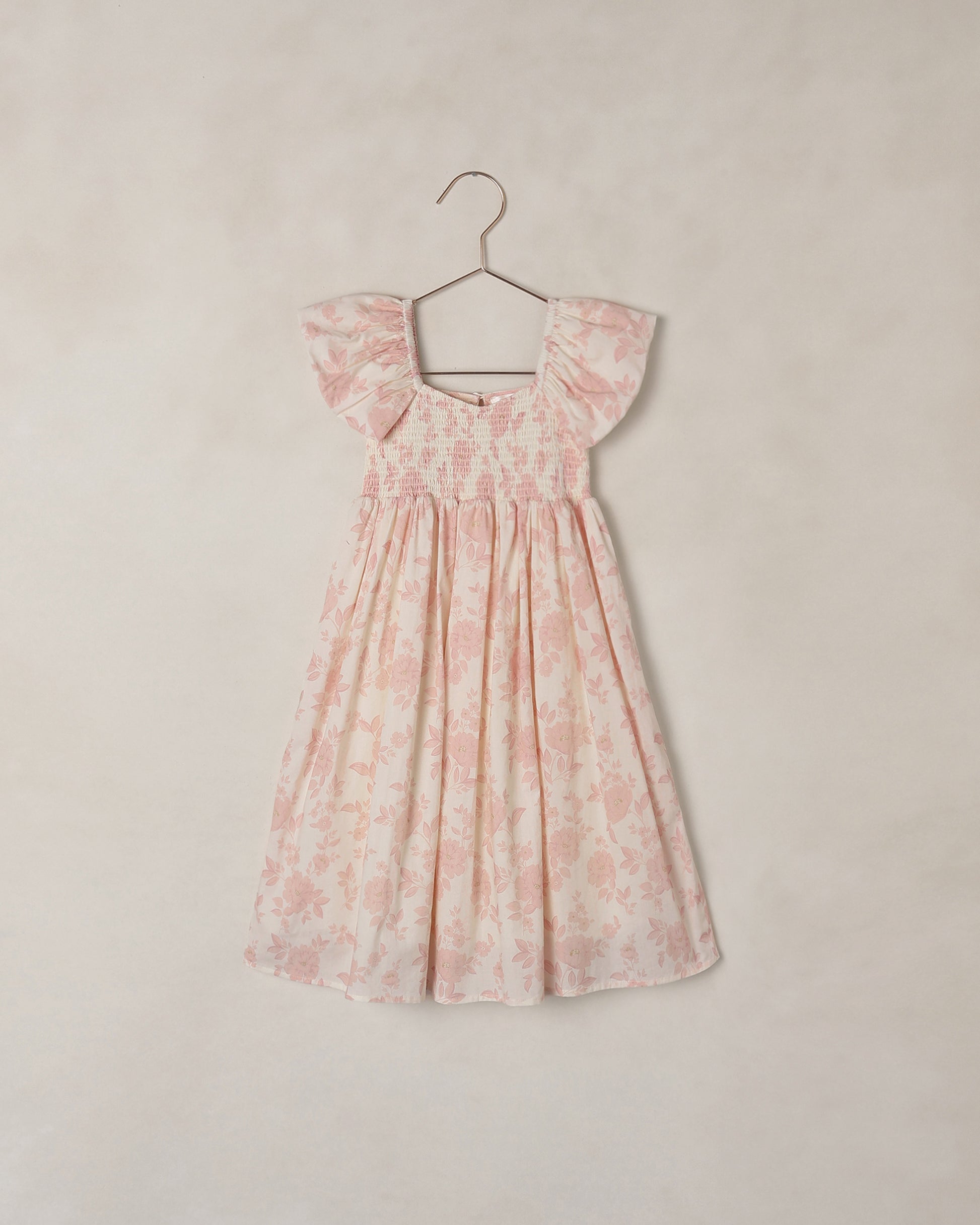 Noralee Blush English Rose Hazel Dress with floral pattern, fitted bodice, and flowing skirt, perfect for elegant occasions.