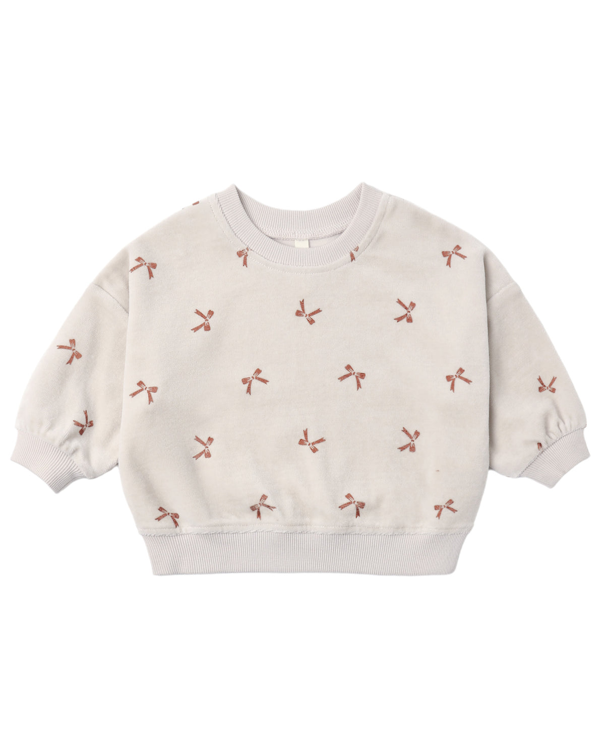 Red velour sweatshirt with bow details from Quincy Mae, relaxed fit, soft fabric, shown on a hanger.
