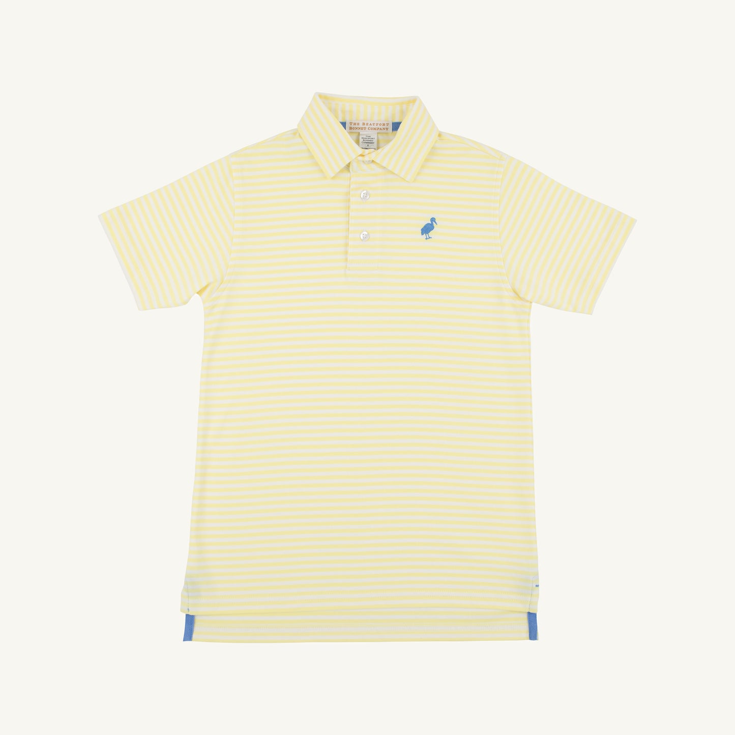Prim and Proper Polo by The Beaufort Bonnet Company featuring yellow stripe and Barbados blue colors, shown on a child.