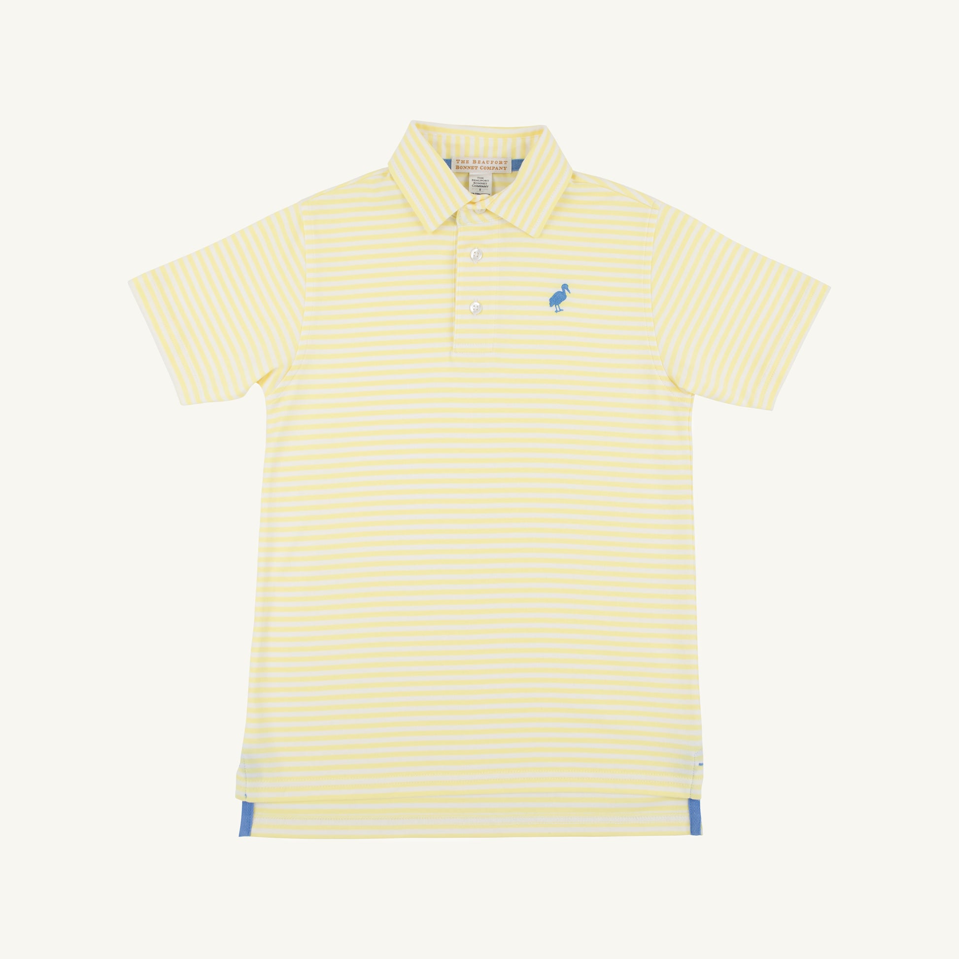 Prim and Proper Polo by The Beaufort Bonnet Company featuring yellow stripe and Barbados blue colors, shown on a child.