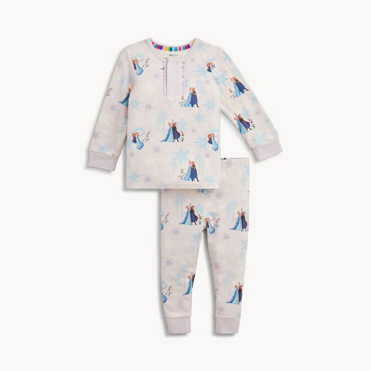 Frozen-themed Magnetic Me right fit long-sleeve pajama set for children, featuring colorful icy design and soft fabric.