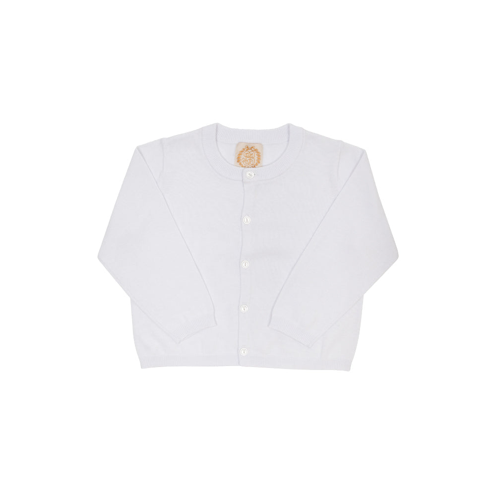 White Cambridge cardigan by The Beaufort Bonnet Company with pearlized buttons, displayed on a neutral background.