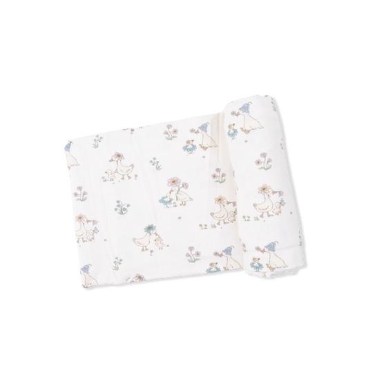 Angel Dear Flower Ducklings swaddle blanket with soft fabric and adorable floral and duckling pattern for babies.